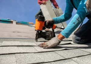 installing roof shingles
